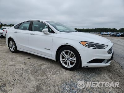 Czwarte zdjęcie samochodu z boku: 2018 FORD FUSION SE HYBRID VIN:3FA6P0LU0JR163520 - miniatura