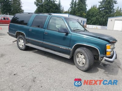 Czwarte zdjęcie samochodu z boku: 1995 CHEVROLET SUBURBAN K1500 VIN:1GNFK16K8SJ421357 - miniatura