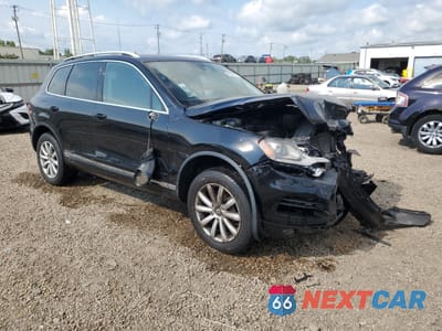 Czwarte zdjęcie samochodu z boku: 2011 VOLKSWAGEN TOUAREG V6 VIN:WVGFF9BP1BD001088 - miniatura