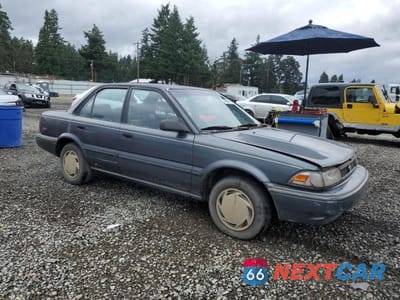 Czwarte zdjęcie samochodu z boku: 1992 TOYOTA COROLLA DLX VIN:JT2AE94A0N0300070 - miniatura