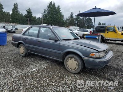 Czwarte zdjęcie samochodu z boku: 1992 TOYOTA COROLLA DLX VIN:JT2AE94A0N0300070 - miniatura