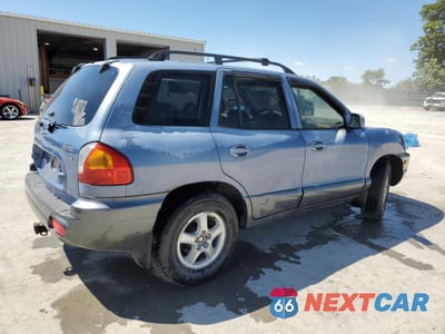 Trzecie zdjęcie samochodu z tyłu: 2002 HYUNDAI SANTA FE GLS VIN:KM8SC13D92U218496 - miniatura