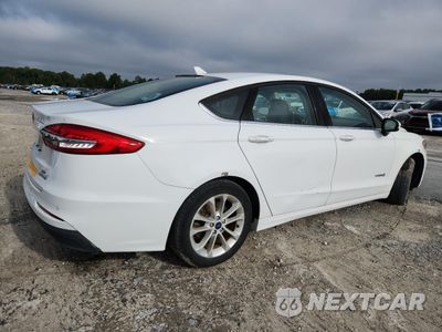 Trzecie zdjęcie samochodu z tyłu: 2019 FORD FUSION SE VIN:3FA6P0LU4KR124849 - miniatura