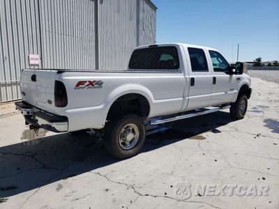 Trzecie zdjęcie samochodu z tyłu: 2004 FORD F350 SRW SUPER DUTY VIN:1FTSW31PX4EB71206 - miniatura