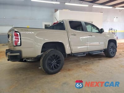 Trzecie zdjęcie samochodu z tyłu: 2022 GMC CANYON ELEVATION VIN:1GTG6CEN6N1328074 - miniatura
