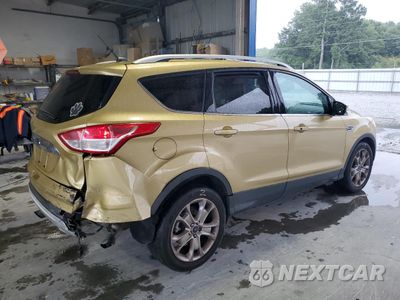 Trzecie zdjęcie samochodu z tyłu: 2014 FORD ESCAPE TITANIUM VIN:1FMCU0JX8EUC41670 - miniatura