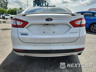 Zdjęcie 6 z 14 samochodu: 2014 FORD FUSION TITANIUM PHEV VIN:3FA6P0SU3ER216962 - miniatura