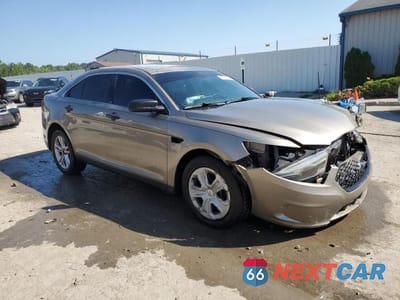 Czwarte zdjęcie samochodu z boku: 2014 FORD TAURUS POLICE INTERCEPTOR VIN:1FAHP2MT7EG156281 - miniatura