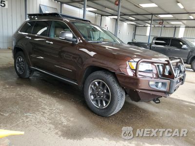 Czwarte zdjęcie samochodu z boku: 2015 JEEP GRAND CHEROKEE SUMMIT VIN:1C4RJFJM3FC956816 - miniatura