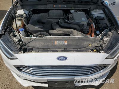 Zdjęcie 11 z 12 samochodu: 2018 FORD FUSION SE HYBRID VIN:3FA6P0LU0JR129870 - miniatura