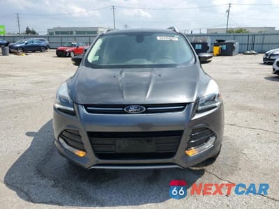 Piąte zdjęcie samochodu w środku: 2016 FORD ESCAPE TITANIUM VIN:1FMCU0JX9GUC09216 - miniatura