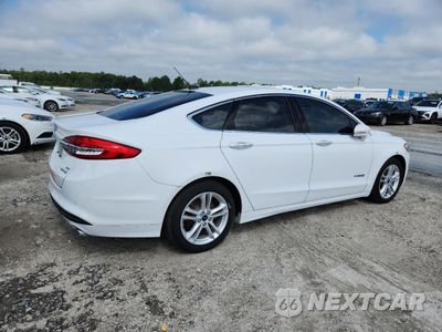 Trzecie zdjęcie samochodu z tyłu: 2018 FORD FUSION SE HYBRID VIN:3FA6P0LU4JR163522 - miniatura