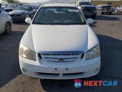 Piąte zdjęcie samochodu w środku: 2006 KIA SPECTRA LX VIN:KNAFE121165239573 - miniatura