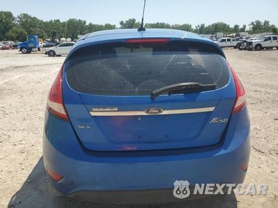 Zdjęcie 6 z 12 samochodu: 2011 FORD FIESTA SES VIN:3FADP4FJ9BM108921 - miniatura