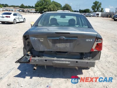 Zdjęcie 6 z 14 samochodu: 2005 FORD FOCUS ZX4 VIN:1FAFP34N35W112850 - miniatura