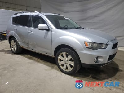 Czwarte zdjęcie samochodu z boku: 2011 MITSUBISHI OUTLANDER SE VIN:JA4JT3AW6BU015916 - miniatura