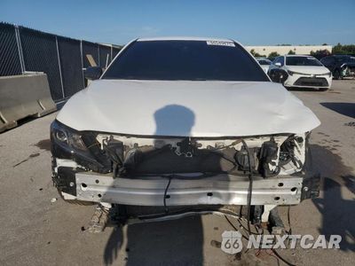 Piąte zdjęcie samochodu w środku: 2019 TOYOTA CAMRY L VIN:4T1B11HK6KU200227 - miniatura