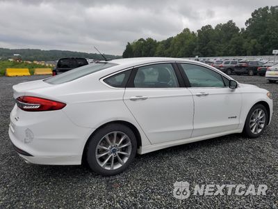 Trzecie zdjęcie samochodu z tyłu: 2017 FORD FUSION SE HYBRID VIN:3FA6P0LU5HR409214 - miniatura