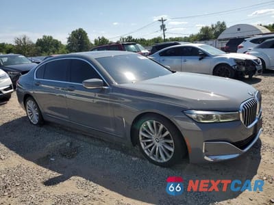 Czwarte zdjęcie samochodu z boku: 2022 BMW 740 XI VIN:WBA7T4C00NCH62629 - miniatura