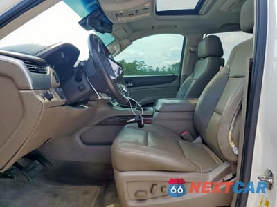 Zdjęcie 7 z 14 samochodu: 2015 GMC YUKON XL C1500 SLT VIN:1GKS1HKC8FR179246 - miniatura