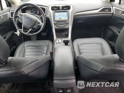 Zdjęcie 8 z 13 samochodu: 2018 FORD FUSION SE HYBRID VIN:3FA6P0LU5JR259143 - miniatura