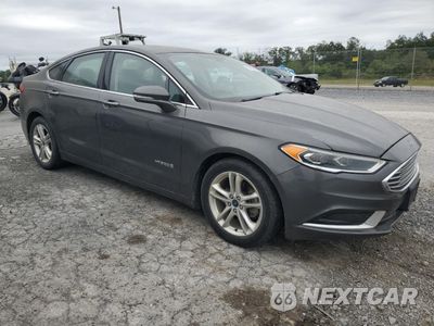Czwarte zdjęcie samochodu z boku: 2018 FORD FUSION SE HYBRID VIN:3FA6P0LU5JR259143 - miniatura