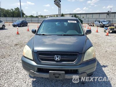 Piąte zdjęcie samochodu w środku: 2004 HONDA PILOT VIN:2HKYF18574H530605 - miniatura
