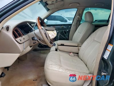 Zdjęcie 7 z 15 samochodu: 2000 LINCOLN TOWN CAR EXECUTIVE VIN:1LNHM81W8YY820974 - miniatura