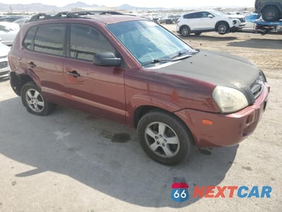 Czwarte zdjęcie samochodu z boku: 2006 HYUNDAI TUCSON GL VIN:KM8JM12B36U298876 - miniatura