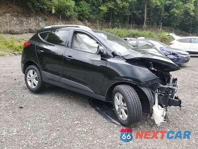 Czwarte zdjęcie samochodu z boku: 2012 HYUNDAI TUCSON GLS VIN:KM8JUCAC0CU472081 - miniatura