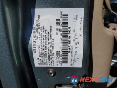 Zdjęcie 12 z 14 samochodu: 2005 FORD FOCUS ZX4 VIN:1FAHP34N05W110059 - miniatura