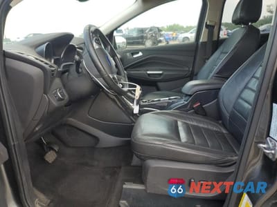 Zdjęcie 7 z 14 samochodu: 2016 FORD ESCAPE TITANIUM VIN:1FMCU0JX9GUC09216 - miniatura