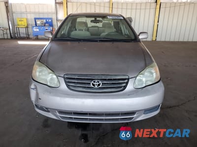 Piąte zdjęcie samochodu w środku: 2003 TOYOTA COROLLA CE VIN:1NXBR32E43Z013013 - miniatura