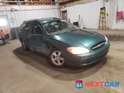 Czwarte zdjęcie samochodu z boku: 2000 FORD TAURUS SE VIN:1FAFP5828YG225641 - miniatura