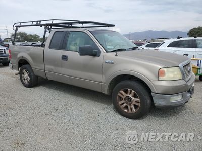Czwarte zdjęcie samochodu z boku: 2004 FORD F150 VIN:1FTPX12504NC61209 - miniatura