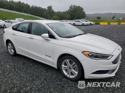 Czwarte zdjęcie samochodu z boku: 2018 FORD FUSION SE HYBRID VIN:3FA6P0LUXJR118794 - miniatura