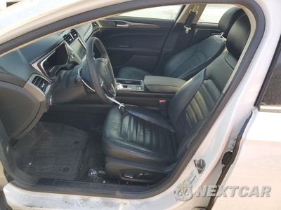 Zdjęcie 7 z 13 samochodu: 2017 FORD FUSION SE HYBRID VIN:3FA6P0LU9HR409345 - miniatura