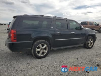 Trzecie zdjęcie samochodu z tyłu: 2011 CHEVROLET SUBURBAN K1500 LTZ VIN:1GNSKKE30BR101577 - miniatura