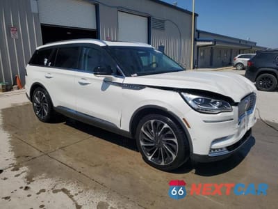 Czwarte zdjęcie samochodu z boku: 2023 LINCOLN AVIATOR RESERVE VIN:5LM5J7WC5PGL30210 - miniatura