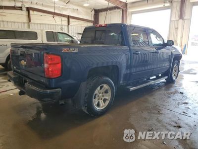 Trzecie zdjęcie samochodu z tyłu: 2016 CHEVROLET SILVERADO K1500 LT VIN:3GCUKREC7GG124436 - miniatura