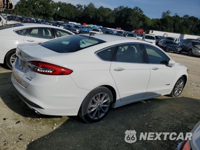 Trzecie zdjęcie samochodu z tyłu: 2017 FORD FUSION SE HYBRID VIN:3FA6P0LU6HR409495 - miniatura