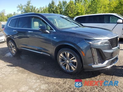 Czwarte zdjęcie samochodu z boku: 2021 CADILLAC XT6 PREMIUM LUXURY VIN:1GYKPDRS1MZ104475 - miniatura