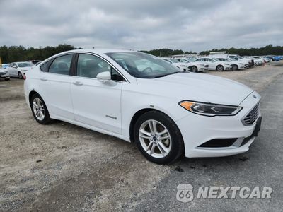 Czwarte zdjęcie samochodu z boku: 2018 FORD FUSION SE HYBRID VIN:3FA6P0LU3JR171725 - miniatura