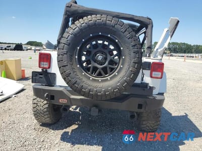 Zdjęcie 6 z 14 samochodu: 2012 JEEP WRANGLER UNLIMITED SAHARA VIN:1C4BJWEG0CL143502 - miniatura