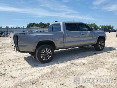Trzecie zdjęcie samochodu z tyłu: 2021 TOYOTA TACOMA DOUBLE CAB VIN:3TMBZ5DN4MM029716 - miniatura