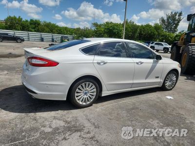 Trzecie zdjęcie samochodu z tyłu: 2014 FORD FUSION TITANIUM PHEV VIN:3FA6P0SU3ER216962 - miniatura