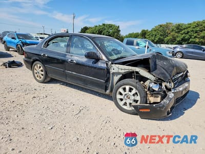 Czwarte zdjęcie samochodu z boku: 2006 KIA OPTIMA LX V6 VIN:KNAGD128765439250 - miniatura