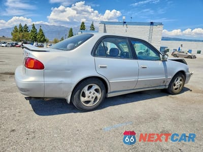 Trzecie zdjęcie samochodu z tyłu: 2001 TOYOTA COROLLA S VIN:1NXBR12E01Z540323 - miniatura
