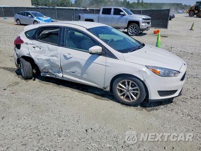 Czwarte zdjęcie samochodu z boku: 2016 FORD FOCUS SE VIN:1FADP3K24GL261353 - miniatura
