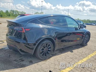 Trzecie zdjęcie samochodu z tyłu: 2022 TESLA MODEL Y VIN:7SAYGAEE5NF427453 - miniatura